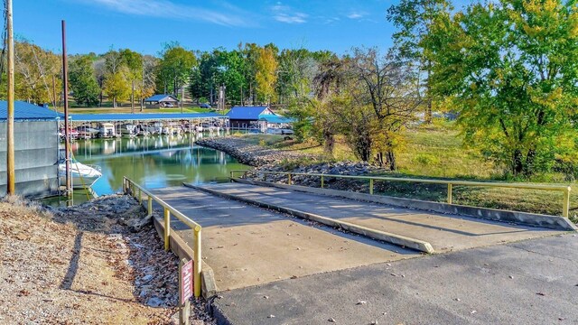 31 Bradley Ln, Bath Springs, TN 38311 - dock area featuring a boat ramp and a water view