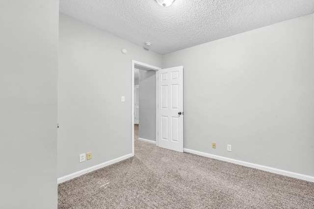 720 Superior Ln, Clarksville, TN 37043 - carpeted spare room featuring a textured ceiling and baseboards