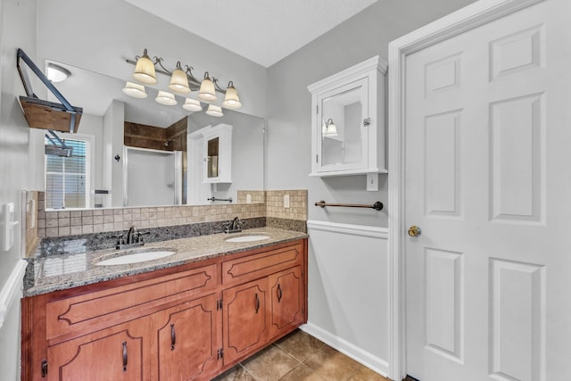 720 Superior Ln, Clarksville, TN 37043 - full bathroom with a stall shower, decorative backsplash, double vanity, and tile patterned flooring
