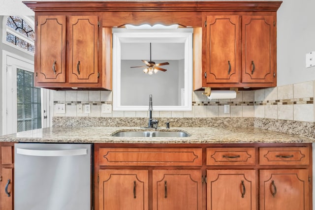 720 Superior Ln, Clarksville, TN 37043 - kitchen featuring dishwasher, ceiling fan, backsplash, brown cabinets, and light stone countertops