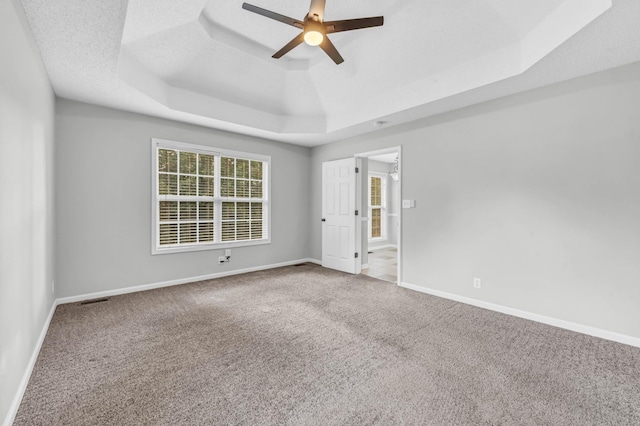 720 Superior Ln, Clarksville, TN 37043 - empty room featuring a tray ceiling, carpet floors, and a ceiling fan
