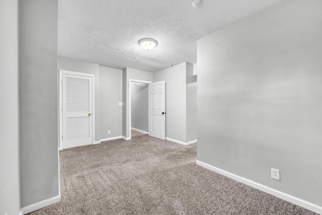 720 Superior Ln, Clarksville, TN 37043 - unfurnished bedroom with a textured ceiling, carpet flooring, and a closet