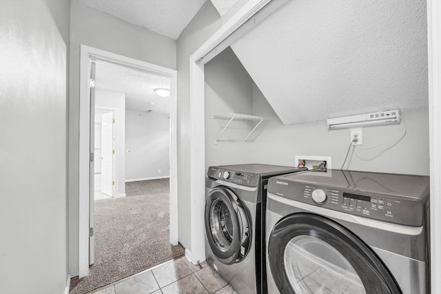 720 Superior Ln, Clarksville, TN 37043 - washroom featuring a textured ceiling, washing machine and clothes dryer, carpet flooring, and tile patterned flooring