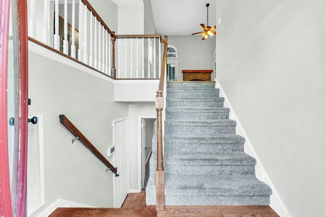 720 Superior Ln, Clarksville, TN 37043 - staircase with a ceiling fan and baseboards