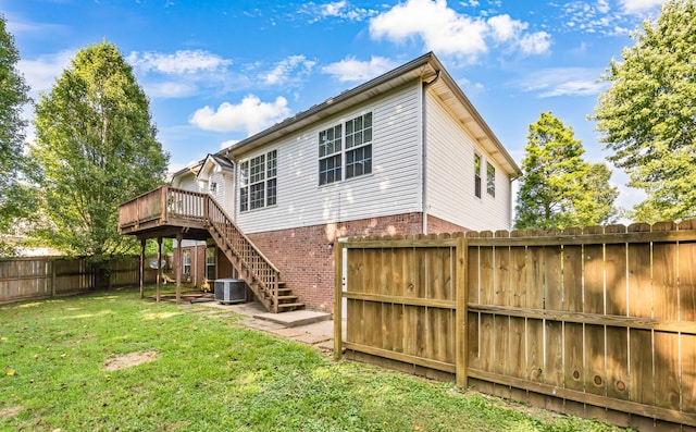 720 Superior Ln, Clarksville, TN 37043 - rear view of house featuring a fenced backyard, a wooden deck, stairway, and brick siding