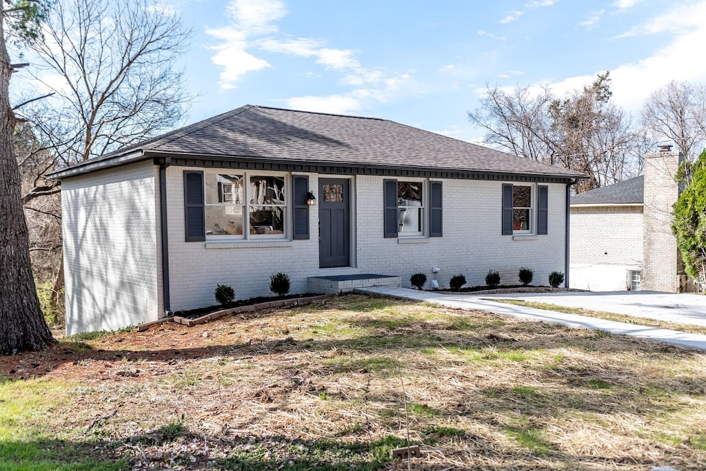 4967 Karen Ray Dr, Antioch, TN 37013 - view of front of home with brick siding and a shingled roof