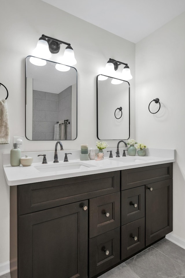 706 Running Deer Dr, Columbia, TN 38401 - bathroom featuring double vanity and tile patterned flooring