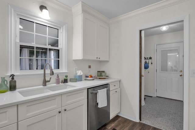 706 Running Deer Dr, Columbia, TN 38401 - kitchen with stainless steel dishwasher, white cabinets, dark wood-type flooring, and ornamental molding