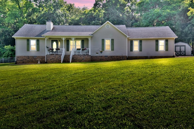 706 Running Deer Dr, Columbia, TN 38401 - single story home with crawl space, a storage unit, a porch, and a chimney
