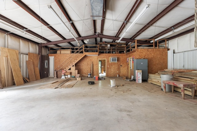 599 Countryside Dr, Loretto, TN 38469 - garage featuring a wall mounted AC