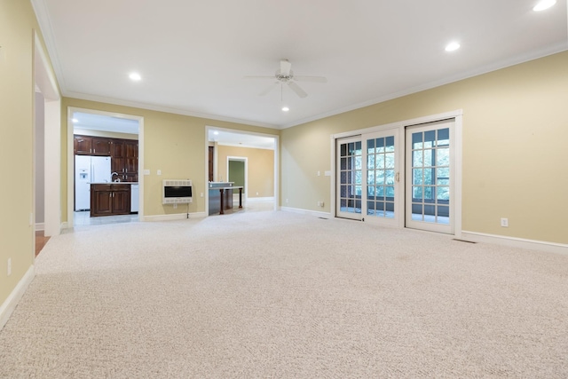 599 Countryside Dr, Loretto, TN 38469 - unfurnished living room with heating unit, ornamental molding, a ceiling fan, light colored carpet, and recessed lighting
