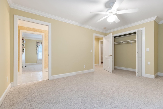 599 Countryside Dr, Loretto, TN 38469 - unfurnished bedroom featuring carpet, crown molding, a closet, and a ceiling fan