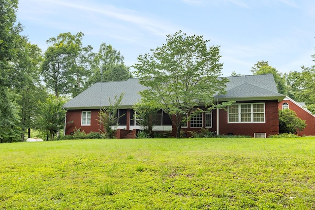 599 Countryside Dr, Loretto, TN 38469 - ranch-style house with a front lawn, brick siding, and a shingled roof