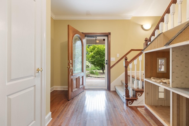 599 Countryside Dr, Loretto, TN 38469 - entrance foyer featuring hardwood / wood-style floors, stairs, and ornamental molding