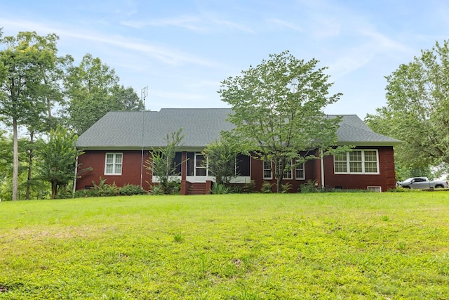 599 Countryside Dr, Loretto, TN 38469 - ranch-style home with brick siding, a front lawn, roof with shingles, and entry steps