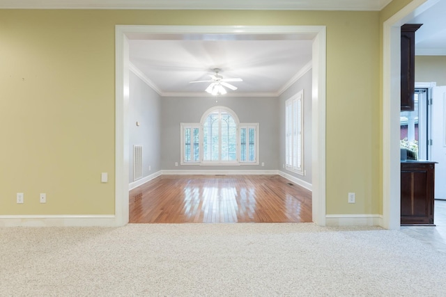 599 Countryside Dr, Loretto, TN 38469 - carpeted spare room with ornamental molding, ceiling fan, and wood finished floors