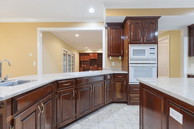 599 Countryside Dr, Loretto, TN 38469 - kitchen featuring white appliances, light countertops, recessed lighting, ornamental molding, and light tile patterned floors