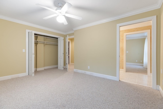 599 Countryside Dr, Loretto, TN 38469 - unfurnished bedroom featuring carpet, crown molding, a closet, and a ceiling fan