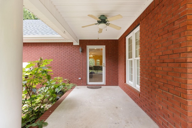 599 Countryside Dr, Loretto, TN 38469 - doorway to property featuring a ceiling fan, brick siding, and a patio