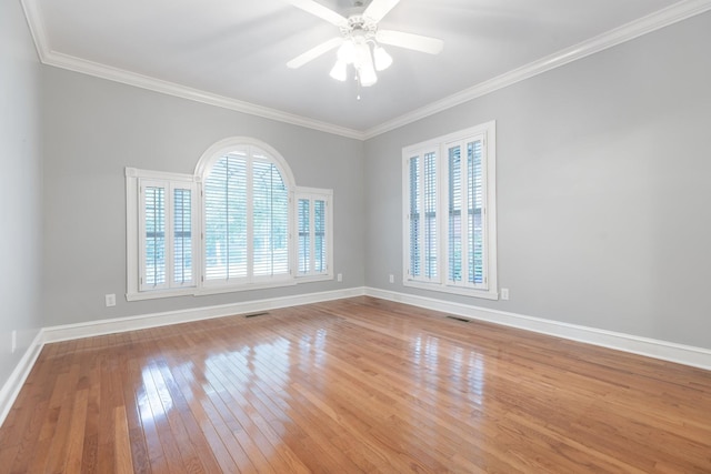 599 Countryside Dr, Loretto, TN 38469 - empty room with hardwood / wood-style flooring, a ceiling fan, and crown molding