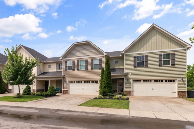 4114 Giacomo Dr, Murfreesboro, TN 37128 - craftsman inspired home featuring driveway, an attached garage, and stone siding