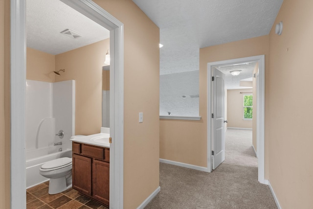 4114 Giacomo Dr, Murfreesboro, TN 37128 - bathroom featuring a textured ceiling, vanity, and shower / tub combination