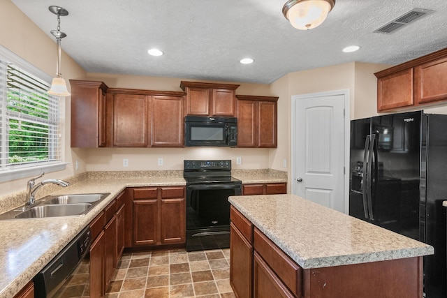 4114 Giacomo Dr, Murfreesboro, TN 37128 - kitchen with black appliances, a center island, light countertops, a textured ceiling, and hanging light fixtures