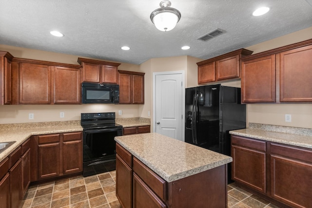 4114 Giacomo Dr, Murfreesboro, TN 37128 - kitchen featuring black appliances, a center island, recessed lighting, light countertops, and a textured ceiling