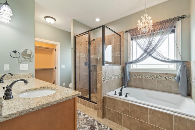5010 Moretto Ct, Spring Hill, TN 37174 - full bath with a stall shower, a bath, double vanity, tile patterned floors, and a spacious closet