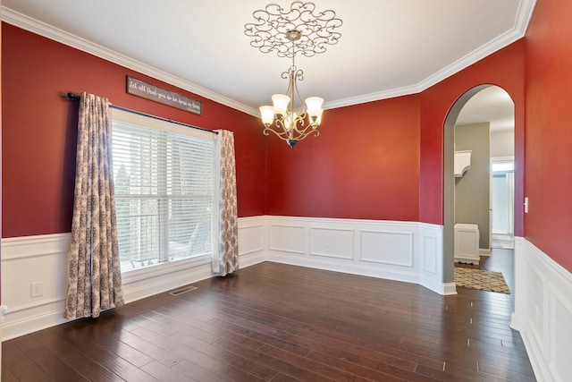 5010 Moretto Ct, Spring Hill, TN 37174 - unfurnished room with wainscoting, a chandelier, arched walkways, ornamental molding, and wood finished floors