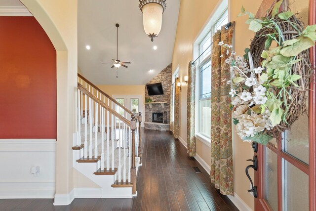 5010 Moretto Ct, Spring Hill, TN 37174 - foyer entrance with plenty of natural light, a fireplace, a ceiling fan, stairway, and high vaulted ceiling