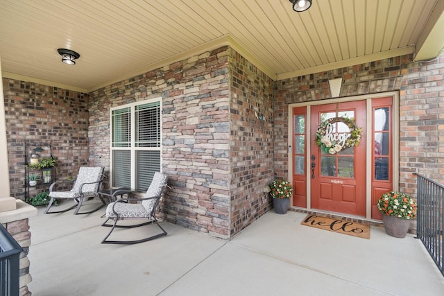 5010 Moretto Ct, Spring Hill, TN 37174 - entrance to property featuring brick siding and a porch