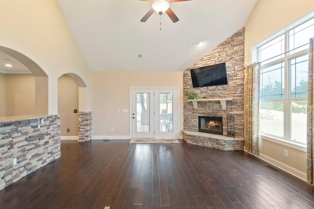 5010 Moretto Ct, Spring Hill, TN 37174 - unfurnished living room featuring ceiling fan, a stone fireplace, hardwood / wood-style floors, and high vaulted ceiling