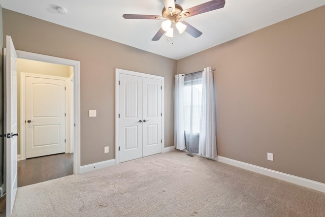 5010 Moretto Ct, Spring Hill, TN 37174 - unfurnished bedroom featuring carpet, a closet, and a ceiling fan