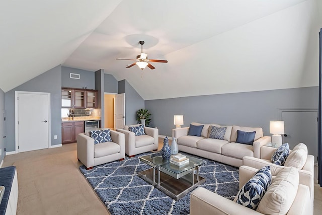 5010 Moretto Ct, Spring Hill, TN 37174 - living room with vaulted ceiling, a ceiling fan, wine cooler, light carpet, and bar