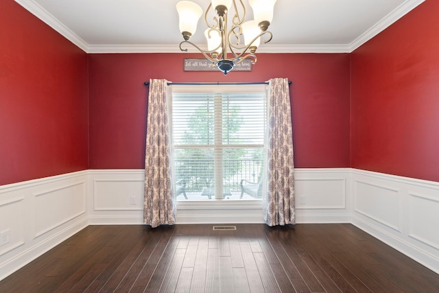 5010 Moretto Ct, Spring Hill, TN 37174 - unfurnished dining area featuring a chandelier, a wainscoted wall, wood finished floors, and ornamental molding