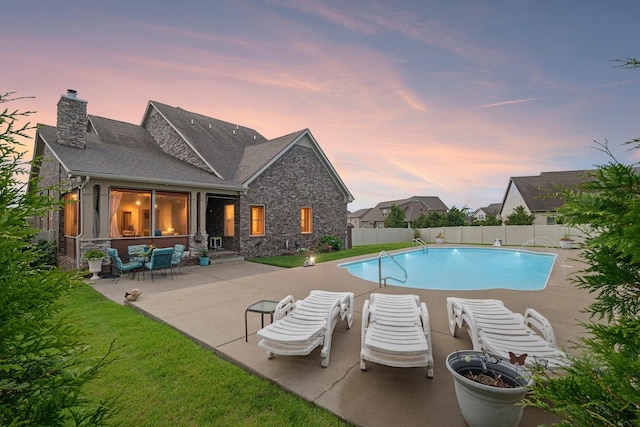 5010 Moretto Ct, Spring Hill, TN 37174 - pool at dusk with a patio