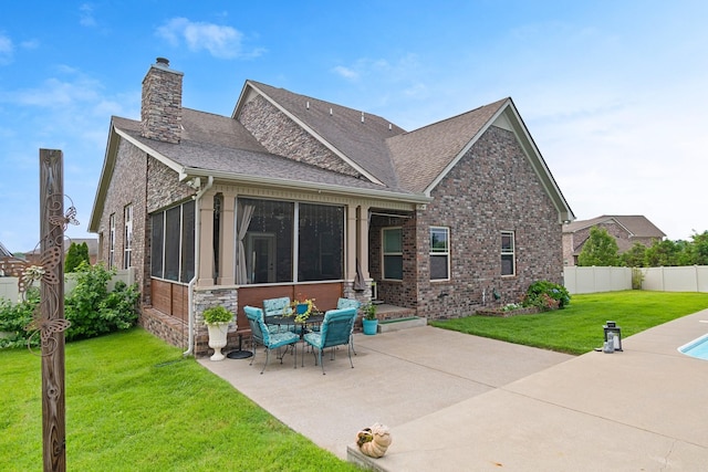 5010 Moretto Ct, Spring Hill, TN 37174 - rear view of house with a patio, a chimney, a fenced backyard, roof with shingles, and a sunroom