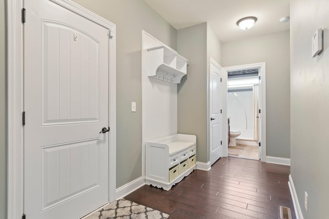 5010 Moretto Ct, Spring Hill, TN 37174 - mudroom with dark wood finished floors and baseboards