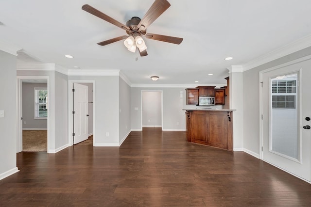 1205 Slaters Creek Rd, Goodlettsville, TN 37072 - unfurnished living room with ceiling fan, ornamental molding, dark wood finished floors, and recessed lighting