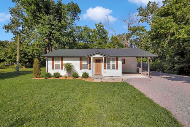 1205 Slaters Creek Rd, Goodlettsville, TN 37072 - ranch-style home with dirt driveway, a front yard, a carport, and a metal roof