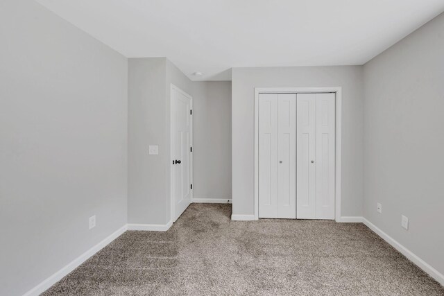 1205 Slaters Creek Rd, Goodlettsville, TN 37072 - unfurnished bedroom featuring carpet floors and a closet
