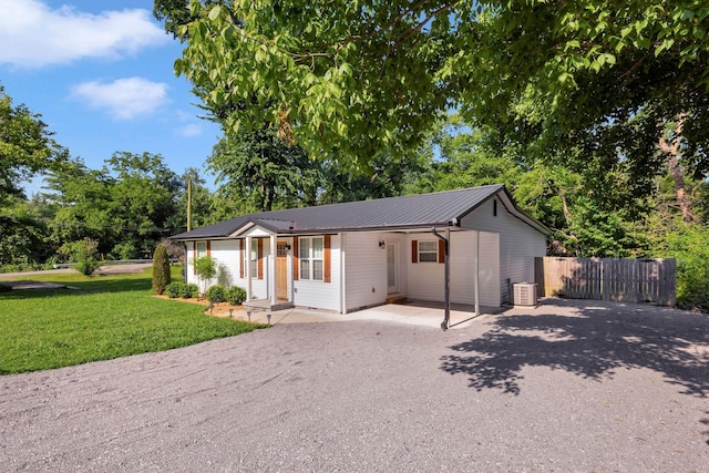 1205 Slaters Creek Rd, Goodlettsville, TN 37072 - single story home featuring driveway, a metal roof, and view of scattered trees