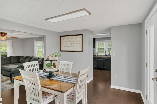 2750 Clampit Hollow Rd, Lafayette, TN 37083 - dining space featuring dark wood-type flooring, healthy amount of natural light, a textured ceiling, and ceiling fan