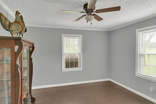 2750 Clampit Hollow Rd, Lafayette, TN 37083 - unfurnished room featuring dark wood-style floors, a ceiling fan, ornamental molding, and a textured ceiling