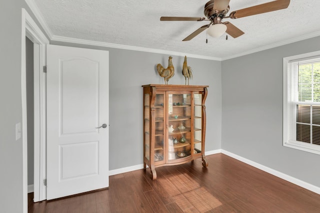 2750 Clampit Hollow Rd, Lafayette, TN 37083 - empty room with a textured ceiling, a ceiling fan, wood finished floors, and ornamental molding