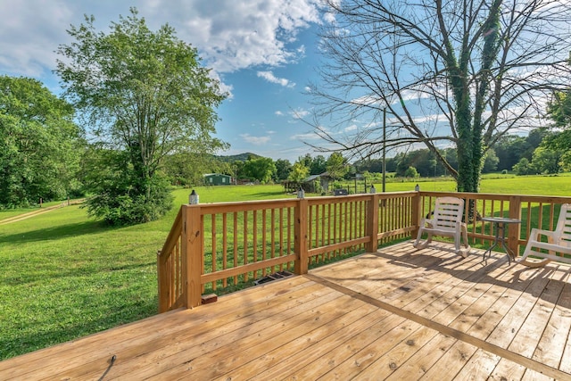 2750 Clampit Hollow Rd, Lafayette, TN 37083 - wooden deck featuring a lawn