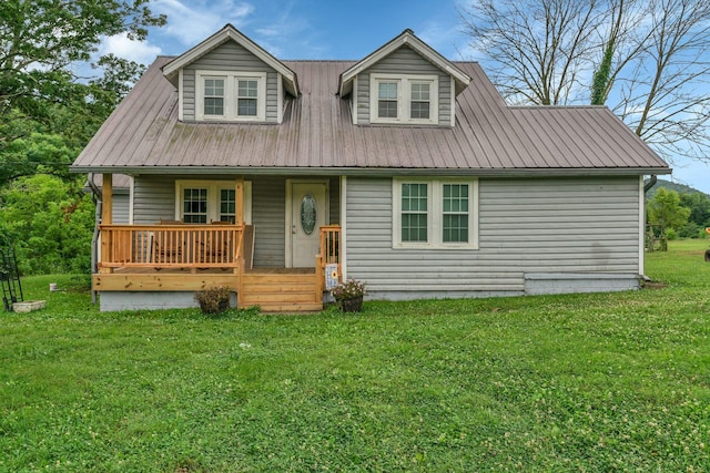 2750 Clampit Hollow Rd, Lafayette, TN 37083 - view of front of home with covered porch, a metal roof, and a front lawn