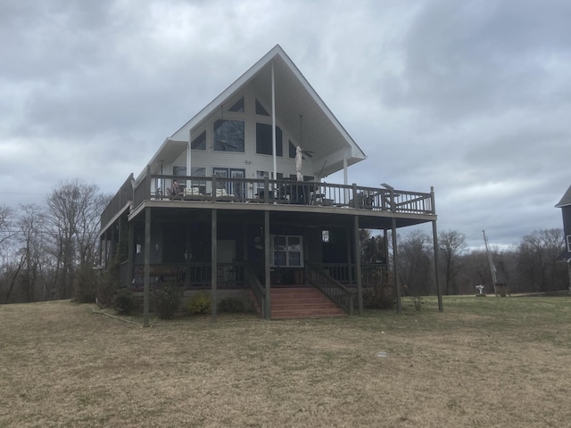 1178 Miracle Rd, Decaturville, TN 38329 - back of house featuring a deck and a lawn