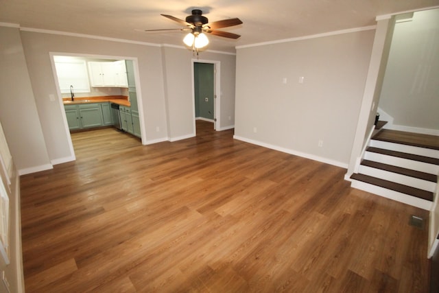 61 Kentucky Dr, Cadiz, KY 42211 - unfurnished living room featuring a ceiling fan, crown molding, stairs, and wood finished floors